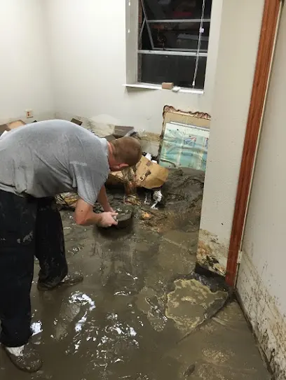Storm flood water damage across the floor of an Arlington, TX home